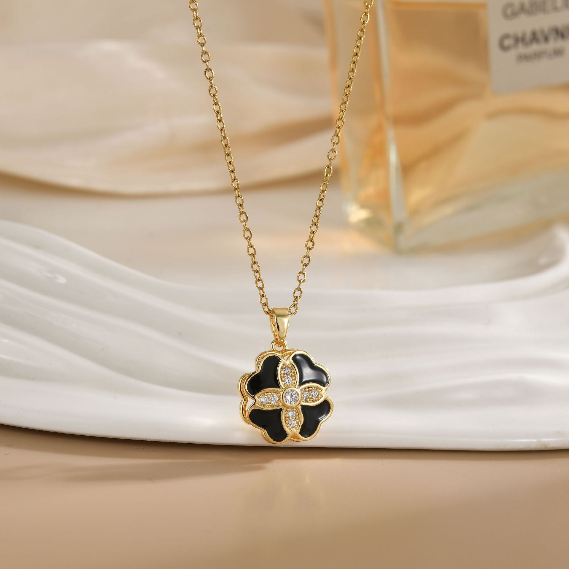 Rotating Zircon Flower Titanium Steel Necklace